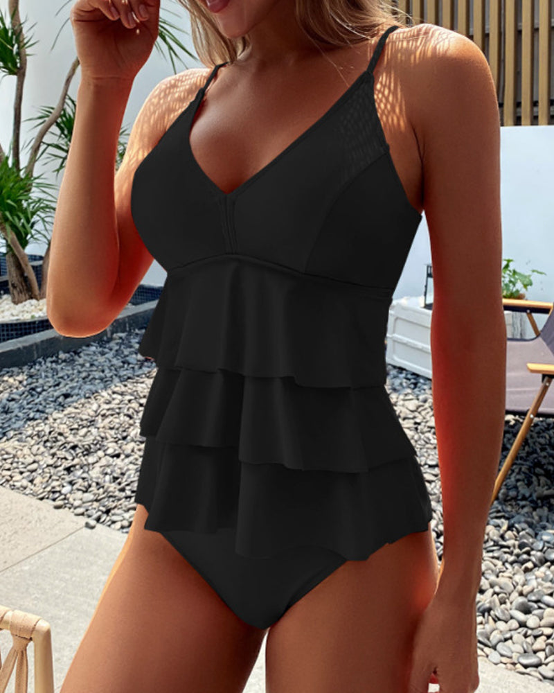 Lia™ - Effen badpak met stijlvolle ruffles